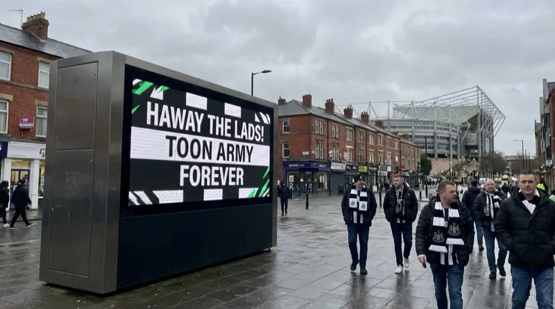Football banter on a digital screen near St James' Park